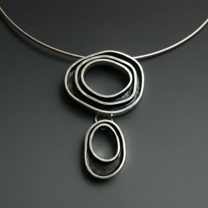 Gargantilla Órbitas Duales